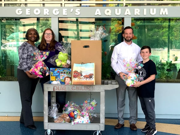 Zach's Toy Chest and Carolina Multisports donating toys to Duke Children's Hospital